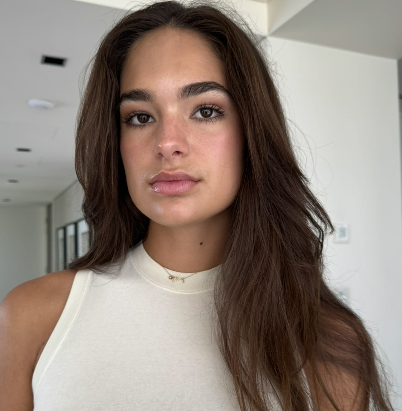 Fresh natural glam with tousled brunette hair