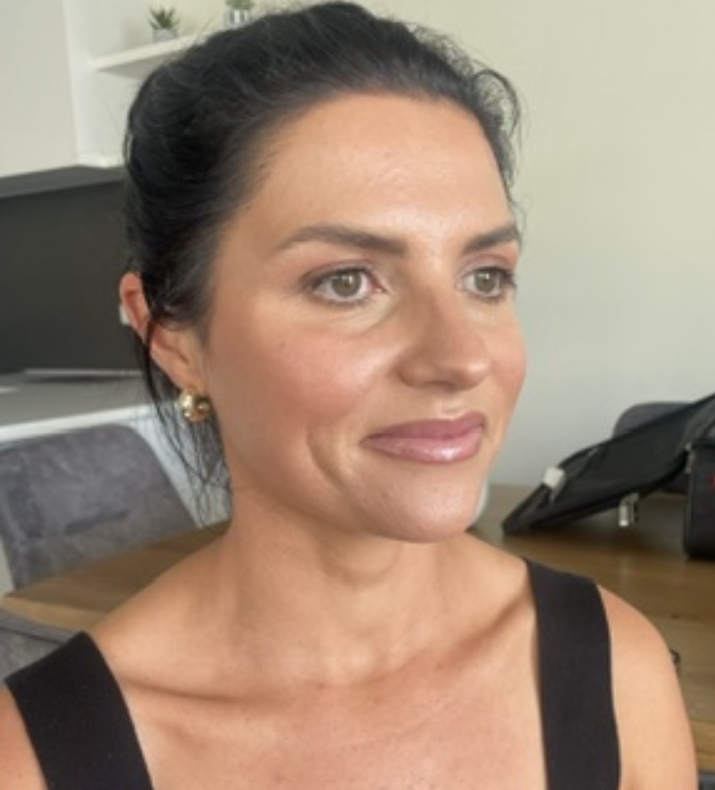 Radiant natural glam with sleek hair